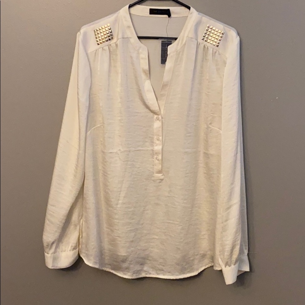 Ivory top with shoulder detail